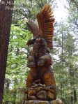 Travel theme: Wood sculpture of a lifesize bear and eagle