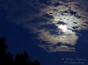 Moon hiding behind the clouds