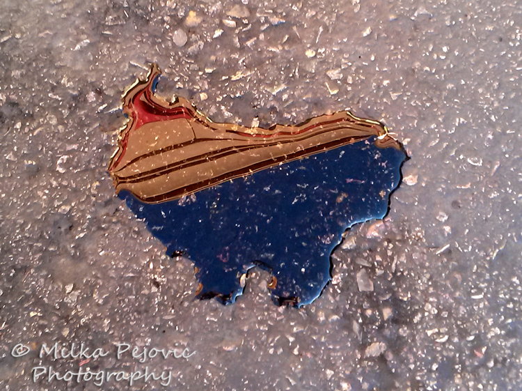 Water puddle in the shape of the United States