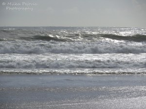 Waves of the Pacific Ocean on a cloudy day